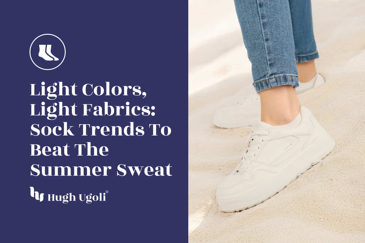 Close-up of a person wearing light-colored no-show socks and white sneakers on sandy beach, reflecting summer sock trends